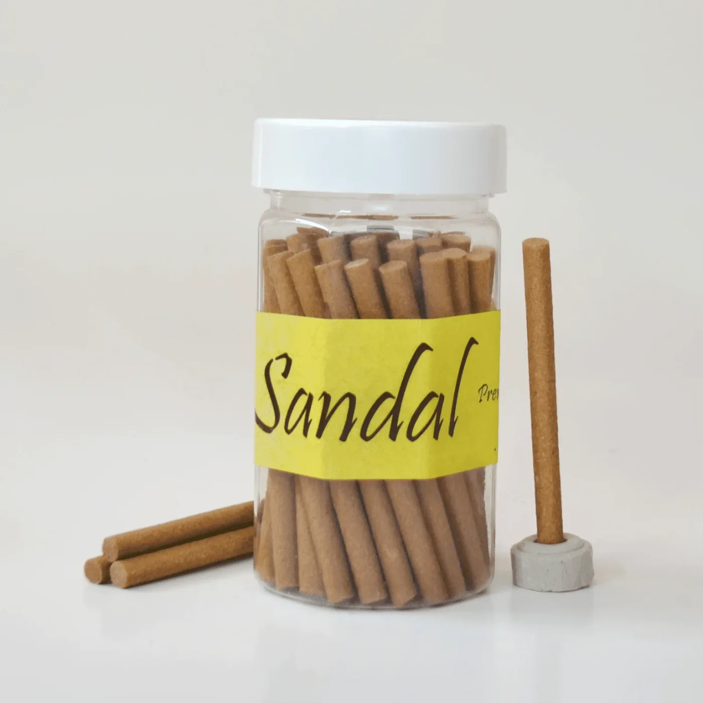 Sandal Bakhoor Sticks, in its bottle.